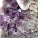 Kindred Crystal Collective — Polished Amethyst Cluster, close-up of dense purple amethyst crystal points on lower section of cluster