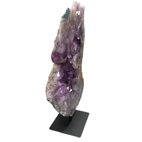 Kindred Crystal Collective — Polished Amethyst Cluster, side profile of tall sculptural amethyst cluster on black metal stand, white background