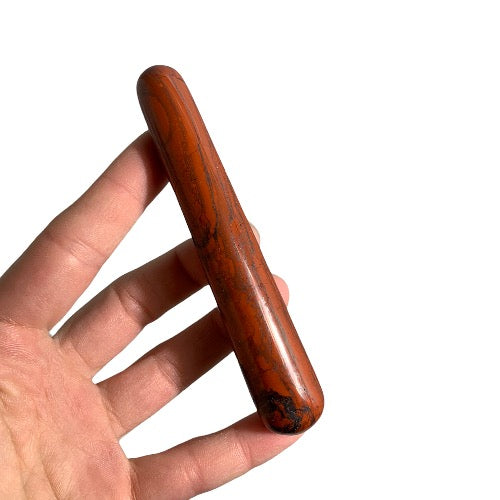 Kindred Crystal Collective — Red Jasper Massage Wand, natural red jasper polished massage wand in deep brick-red and terracotta tones, 11cm