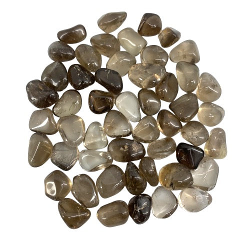 Kindred Crystal Collective — Smoky Quartz Tumbled 1–2cm, large pile of small polished translucent grey to warm brown quartz stones with high-gloss finish on white background