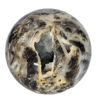 Kindred Crystal Collective — Sphalerite Sphere, natural sphalerite polished sphere in warm amber and honey tones with exceptional refractive brilliance, 70mm