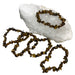 Kindred Crystal Collective — Tiger Eye Gold Chip Bracelets (Pack of 5), polished golden-brown stone chips with rich banding and a silky reflective sheen.