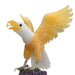 Kindred Crystal Collective — Yellow and White Calcite Eagle, close-up of carved yellow and white calcite eagle with wings spread