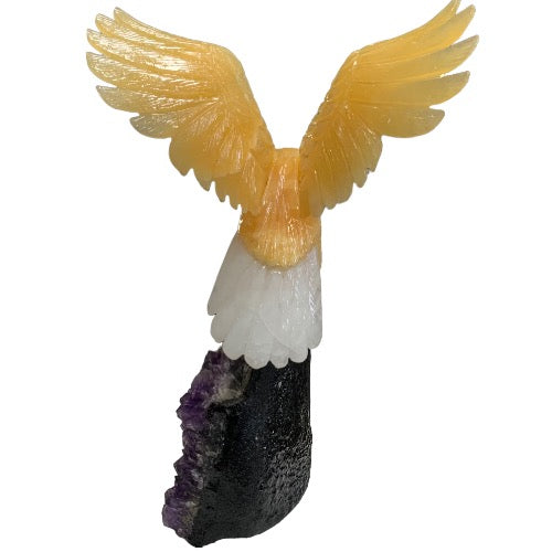 Kindred Crystal Collective — Yellow and White Calcite Eagle, rear view of carved calcite eagle on amethyst cluster base