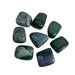 Kindred Crystal Collective — Moss Agate Tumbled 2.5–3cm, seven polished translucent chalcedony stones with deep forest green and grey-blue moss-like dendritic inclusions on white background