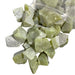 Kindred Crystal Collective — Oil Jade Rough 1KG, pale green raw jade chunks spilling from a clear bag on white background