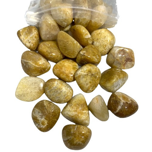 Kindred Crystal Collective — Yellow Aventurine Tumble Stone, golden-yellow polished tumbles spilling from a pack, 500g